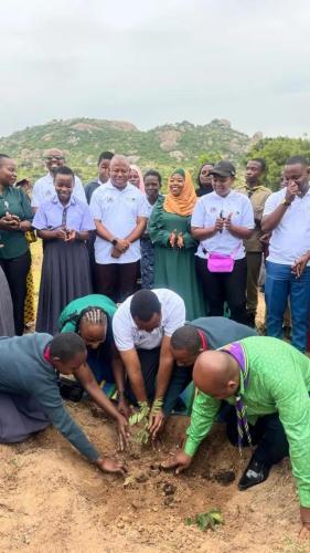 NUPA Leader with other public leader and students planting tree